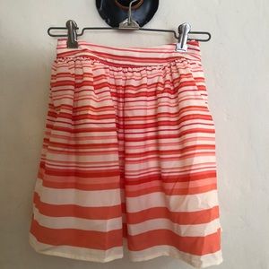 Orange stripped mini skirt